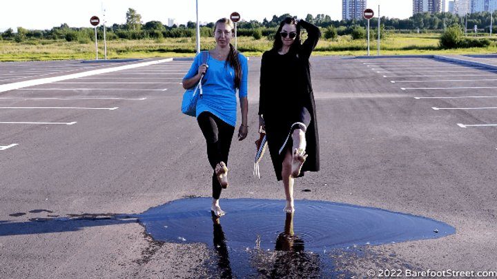 Barefoot Street - Anastasia and Kristina with huge feet barefoot on an asphalt field (Part 3 of 4) #20220420