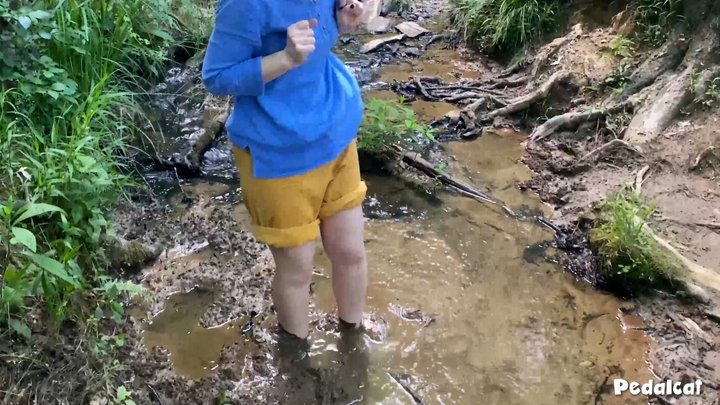 Pedal Cat - Barefoot in the mud, heels getting stuck in the mud, puddle splashing