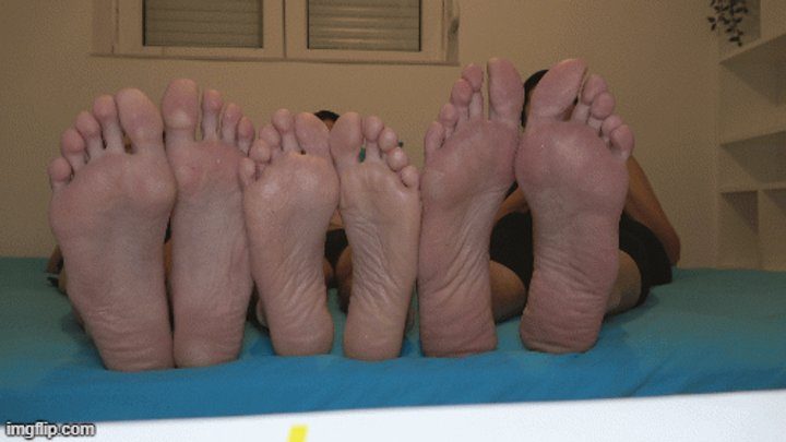 Judas Mistress - small foot of a man between two big woman feet