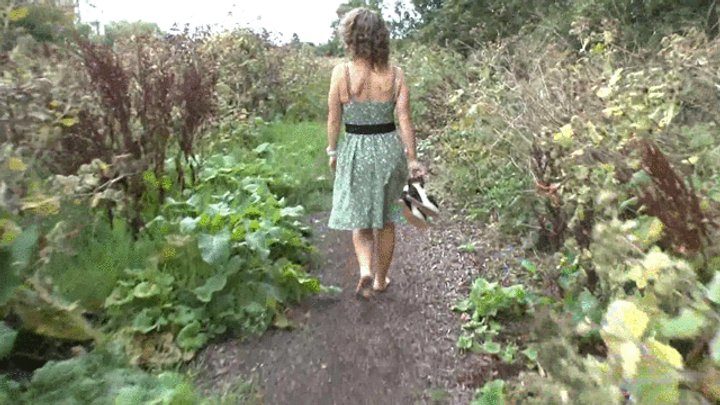 Barefootcityexperience - Zoe wandering barefoot along muddy path
