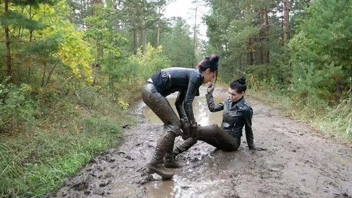 Andrewboots43 - Two leather-clad hotties wrestling in the mud
