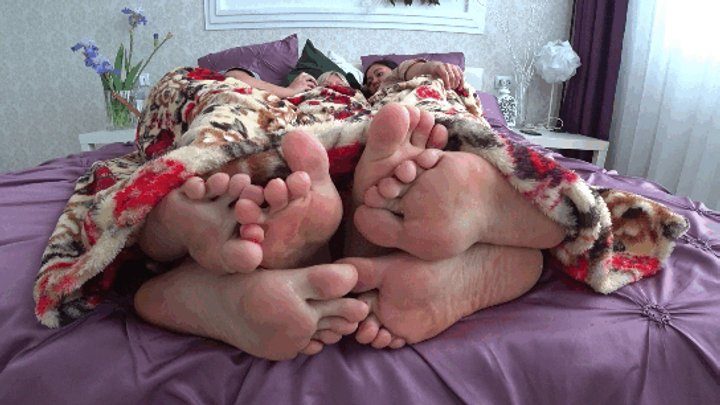 Not An Angel - Three pairs of legs flirting under the blanket aFJ