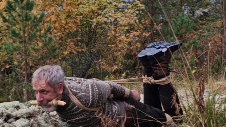 Truetiedtales - Man in boots hogtied in the woods