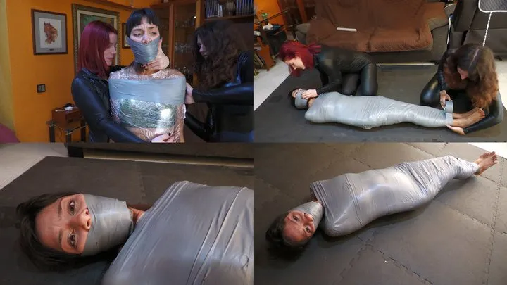 Spanish Ties - Mayla mummified by the catsuit burglars!