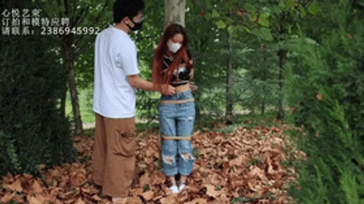 Chinese Bondage Foot Fetish - xy231-A red-haired Chinese girl in jeans was tied to a rope and shackled in the wild and finally tied to a tree