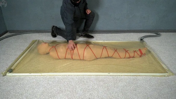 Vacuum Dreams - Mummification with bandages and rope bondage with ankle brace in a vacuum bed