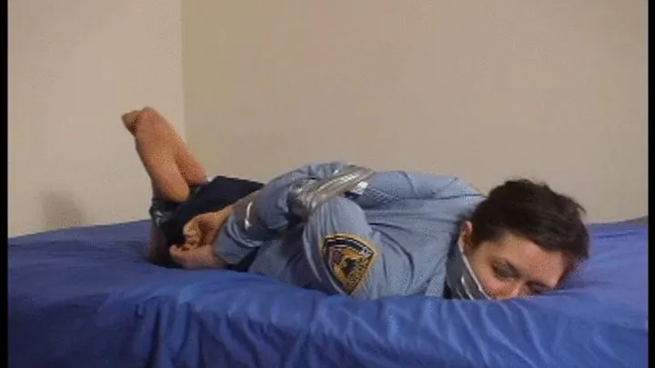 Good Girls In Bondage - Security Guard first day gagged and taped up with real duck tape and elbows pinned together tight