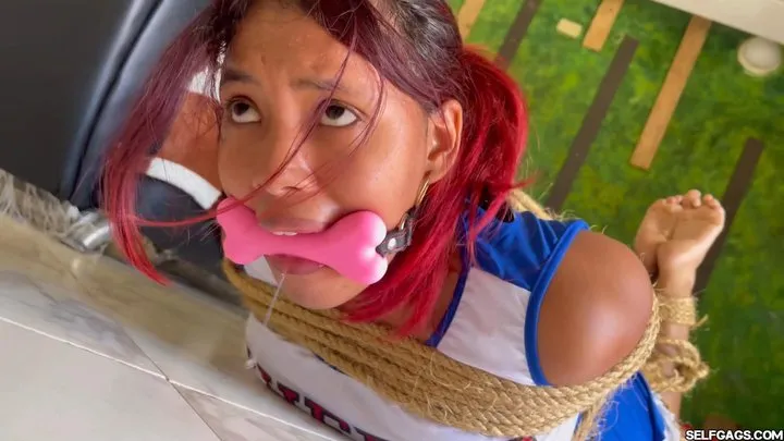 Selfgags - Cheerleader’s Bondage Escape Challenge: Hogtie, Gagging and Sponsorship Bet (high res mp4)