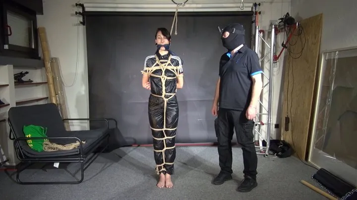 Shinynylonartsbound - Myxxxy bound and gagged in a shiny nylon Jumpsuit