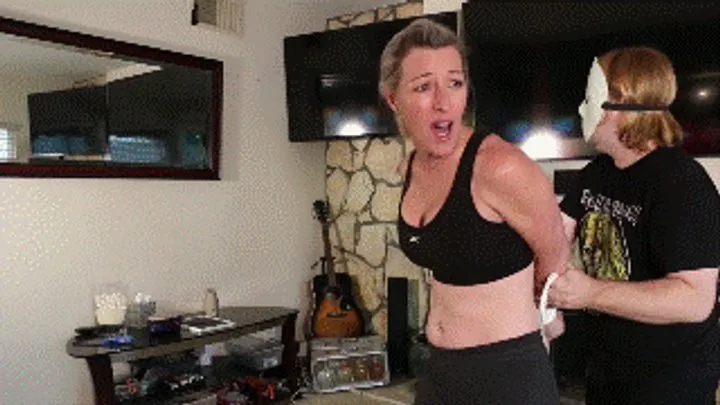 Hollyrope Omega - Amanda Kent, a fit MILF blonde gets tightly hogtied and ballgagged before her morning cycling routine