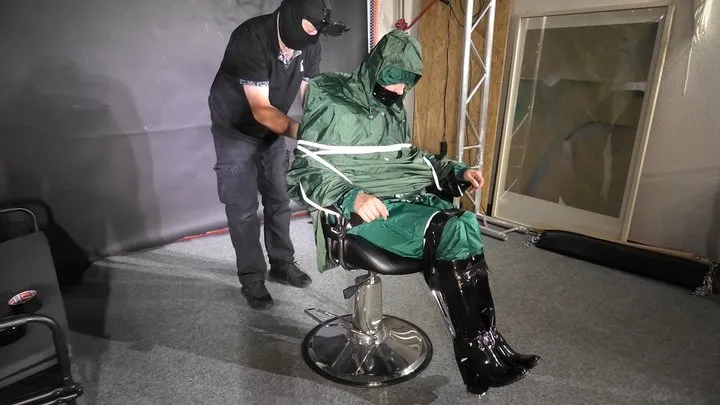 Shinynylonartsbound - Marie M taped and gagged in shiny nylon rainwear