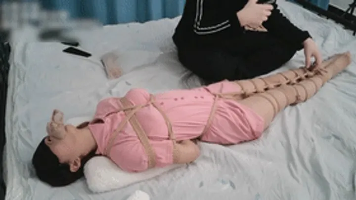 Chinese Bondage Foot Fetish - xy278-The pink nurse with bound hands and feet is placed on the bed and her breasts are kneaded