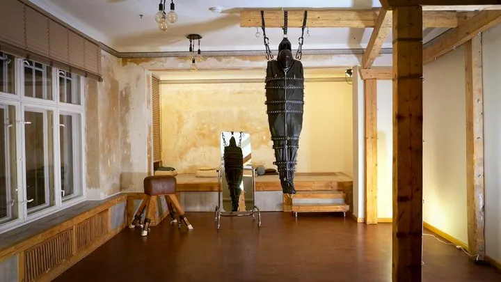 Elise Graves Bondage Liberation - Dangling in Front of Me - Heavy and Elise Graves - Heavy writhes around in a snug leather body bag and thin latex hood suspended from a tall beam as a vibrator makes them orgasm!