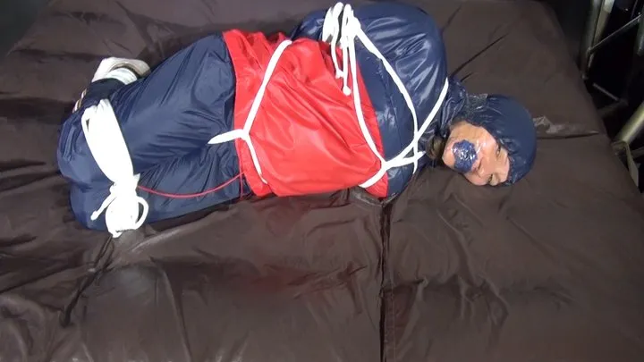 Shinynylonartsbound - Sandra bound and gagged in shiny nylon Rainwear