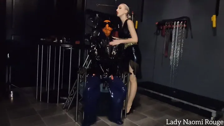 Lady Naomi Rouge - Rubber slave part 1 fixed in a defenceless position
