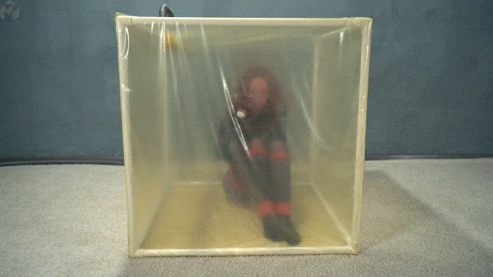 Vacuum Dreams - Bondage with red ropes in a transparent vacuum cube