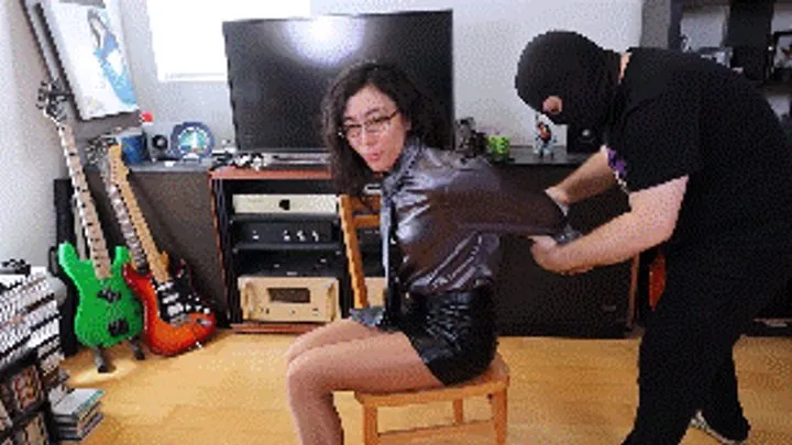 Hollyrope Omega - Khrystal, silver satin blouse and tie secretary fakes a robbery in which she gets tightly tied and gagged, but it was a real robbery PART 1