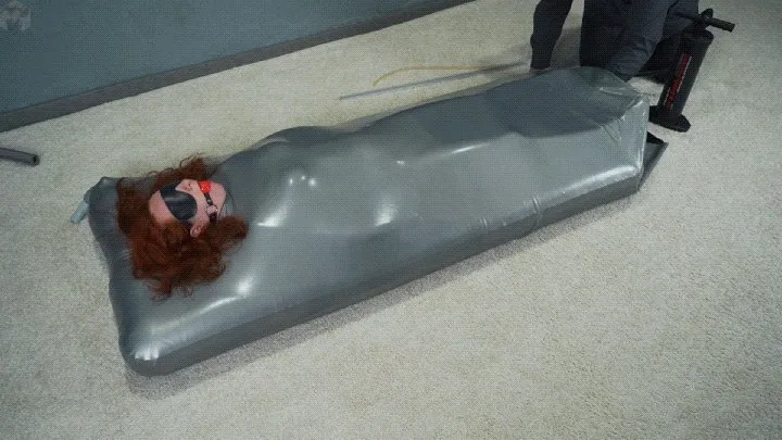Vacuum Dreams - Sonya gagged in a gray vacuum mattress bed