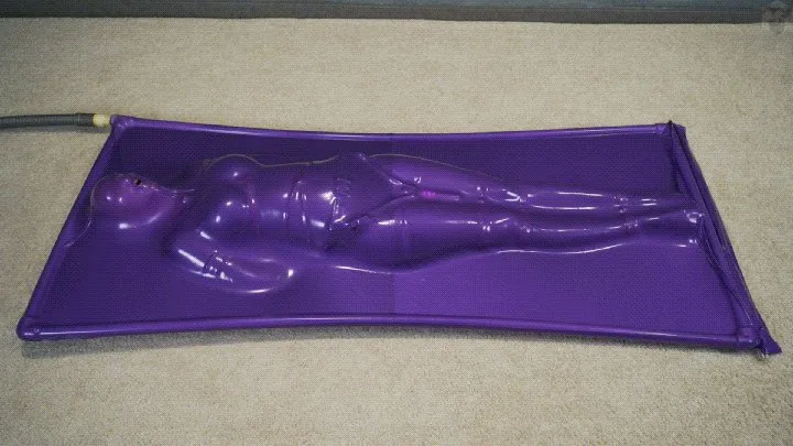 Vacuum Dreams - Purple vacuum bed with rope bondage and vibro belt