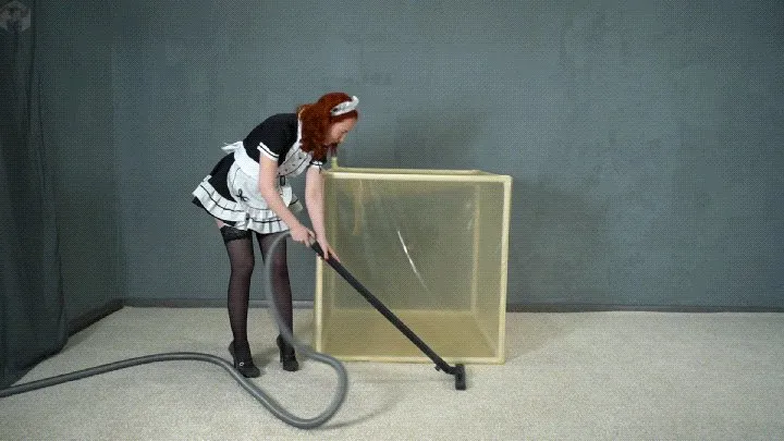 Vacuum Dreams - Maid Sonya in a transparent vacuum cube