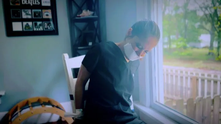 Peachy Keen Pleasures - The Nurse Arrives Home For An Encounter With The Duct Tape Bandit (1080p) - Rachel Adams - scrubs, sneakers, hand over mouth, white tape, tape bondage, tape gag, taped to chair