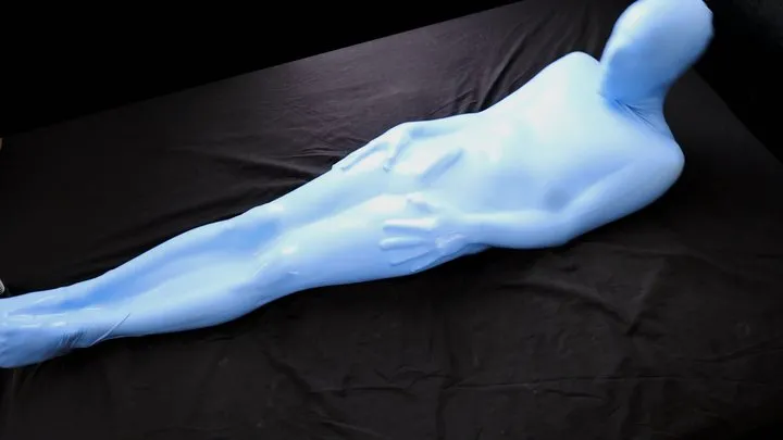 Encasedlatex - Rubberized tightly in a blue latex sack
