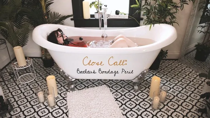 Ditria Rose Fetish - Close Call: Bathtub Bondage Peril | Ditria's eyes fill more and more with fear as the tub only does with water! In a straitjacket, gag, and shackles, she has no idea what to do