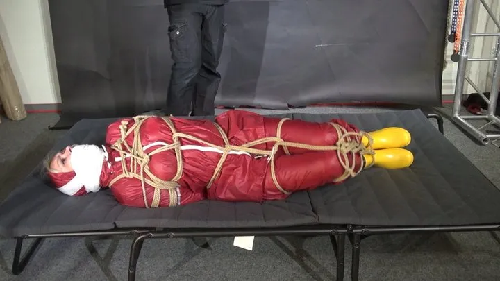 Shinynylonartsbound - Alice tied and gagged in shiny nylon Raingear