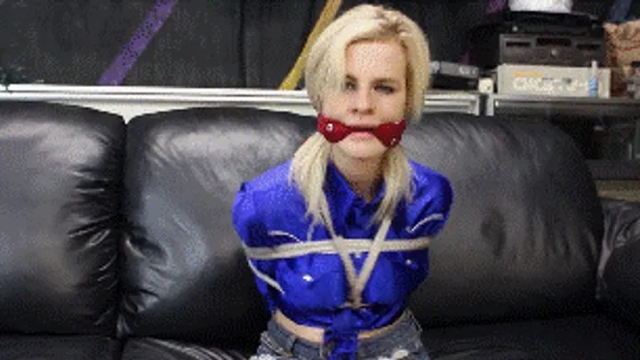 Hollyrope Omega - Catie Parker in her shiny cowgirl outfit hogtied and gagged