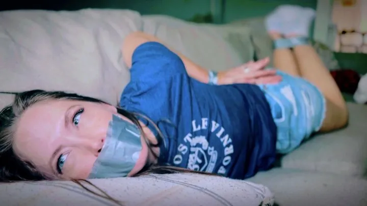 Peachy Keen Pleasures - Captured In Her Ankle Socks, The Intruder Wasted No Time Taping Up Rachel Adams (4K) - Rachel Adams - puma socks, denim skirt, t-shirt, duct tape, hand over mouth, tape gag, tied on sofa