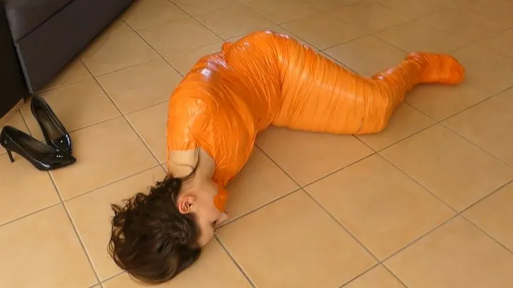 Cordame Bondage - Chloe wriggle mummified in orange tape