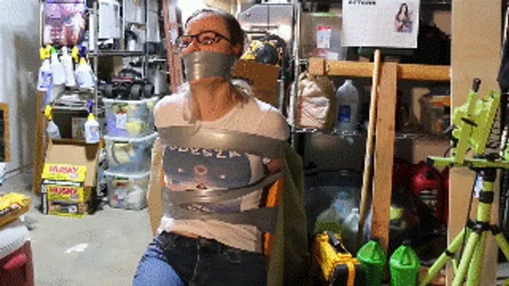 Hollyrope Omega - Cruelly taped up to a chair and wraparound tape gagged, Summer will spend the hours in a dark basement until she gets rescued!