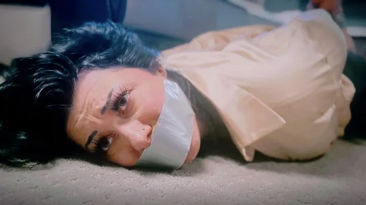 Peachy Keen Pleasures - Bondage Listing - Amethyst Mars - realtor, gold blouse, black pants, black heels, hand over mouth capture, tape bondage, duct tape, tape gagged, struggling