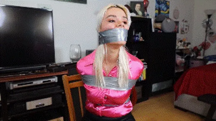 Hollyrope Omega - Angelica Coralvine tightly taped up and massively wraparound tape gagged with mouth stuffed, in a detective story adventure!