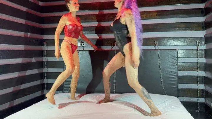 The Wrestling Amazons - Two sexy dominas in lingerie wrestle