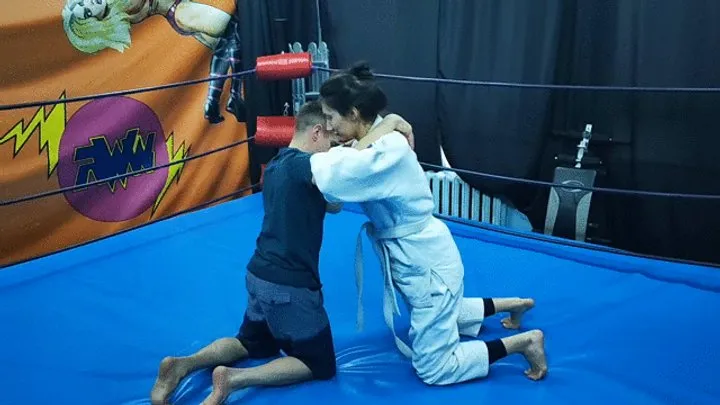 The Wrestling Amazons - Taekwondo girl wrestles in a white gi