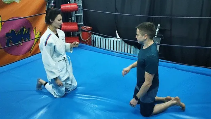 The Wrestling Amazons - Girl in a white gi wrestles