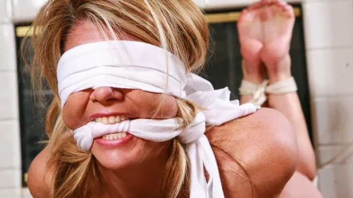 Dominic Wolfe's Gagged Beauties - Hot Dominant Housewife Carissa Tightly Hogtied, Blindfolded and Gagged Fighting it!