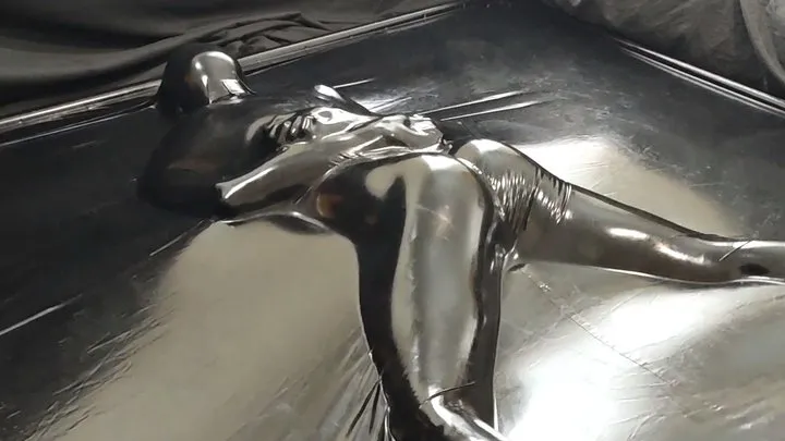 Encasedlatex - Sealed ass up in the latex vacbed