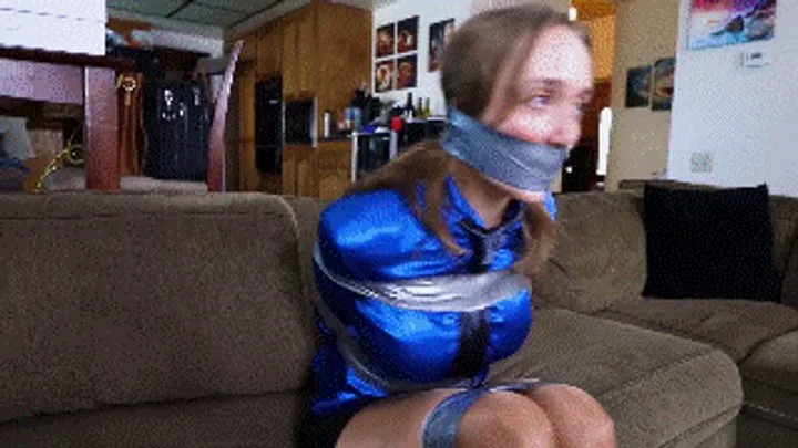 Hollyrope Omega - UPSCALED TO 4K at 60FPS! Jade Rose has to ask her friend to tightly tape her up and wraparound tape gag her to fake a robbery otherwise she'll be fired!