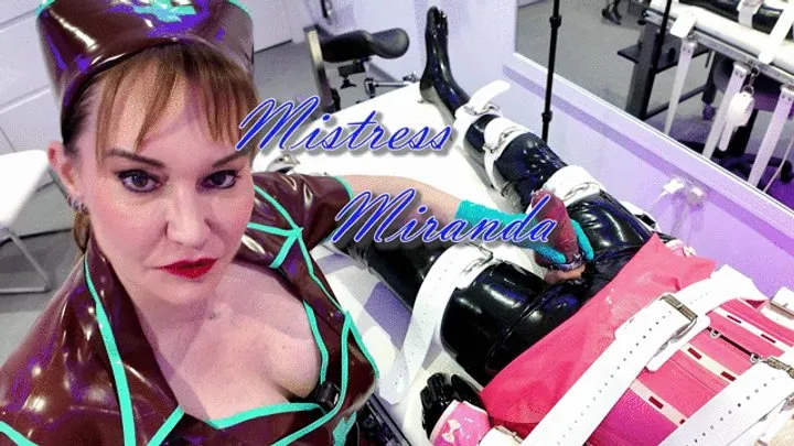 Miss Miranda - The Bondage Mistress - Pink Rubber Bondage 3