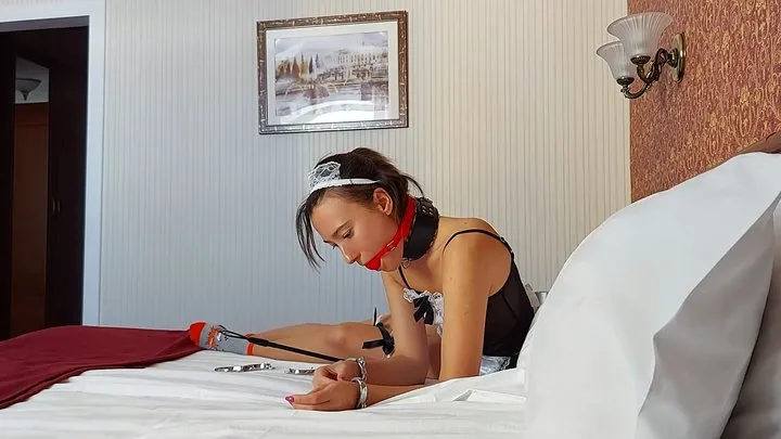 Bondage Dreams - Sofi_Handcuffed maid with a red gag does the cleaning_Tel_Part 1