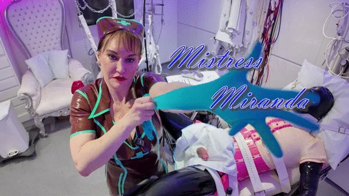 Miss Miranda - The Bondage Mistress - Pink Rubber Bondage 6
