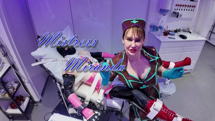 Miss Miranda - The Bondage Mistress - Pink Rubber Bondage 7