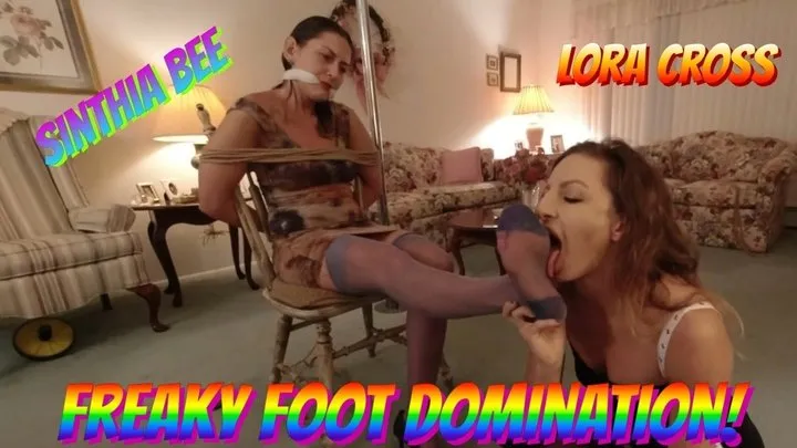 Buzzin Babes - Sinthia Bee & Lora Cross In A Freaky Foot Domination!