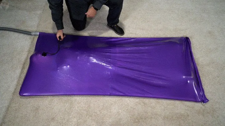 Vacuum Dreams - A girl experiences an orgasm in a lilac vacuum bed with an inflatable gag in her mouth