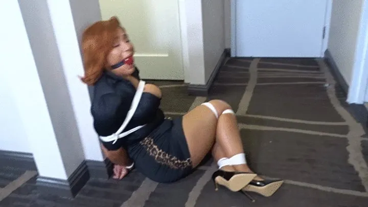 Tucsontied - Enchantress Sahrye struggles in bondage and ball gag by the door...