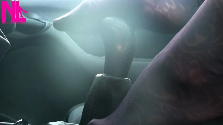 Nylladys Foot Fetish Videos - Caressing and footplaying with the wheel and the shift stick in violet patterned pantyhose