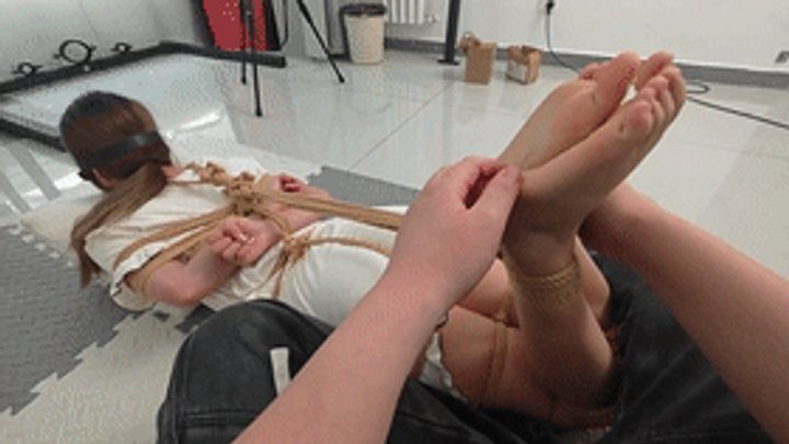 Chinese Bondage Foot Fetish - xy353 - A cute barefoot girl is bound by ropes and has her feet tickled.