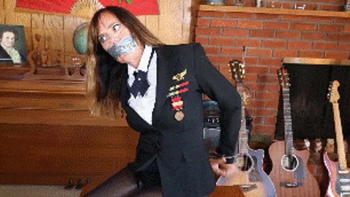 Hollyrope Omega - Dutch Navy officer Jasmine is on a mission to find a missing woman and gets captured, tied up and gagged!